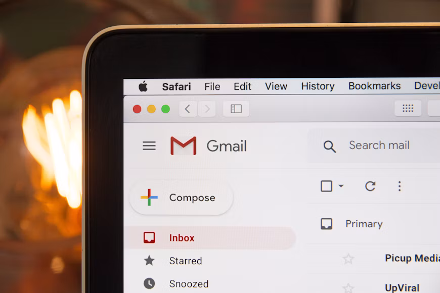 Gmail inbox open in Safari on MacBook.